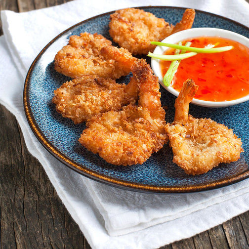 Coconut shrimp with coconut shavings