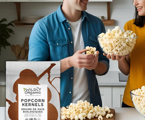 Couple sharing popcorn