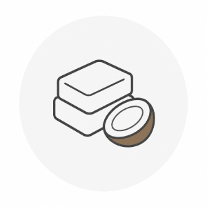 Solid bars of soap next to coconut