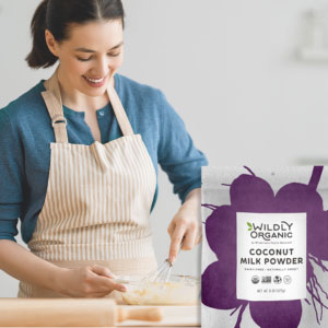 Woman stirring organic coconut milk powder